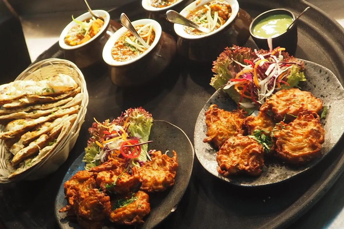 Steamed oats idlis on a plate with chutney